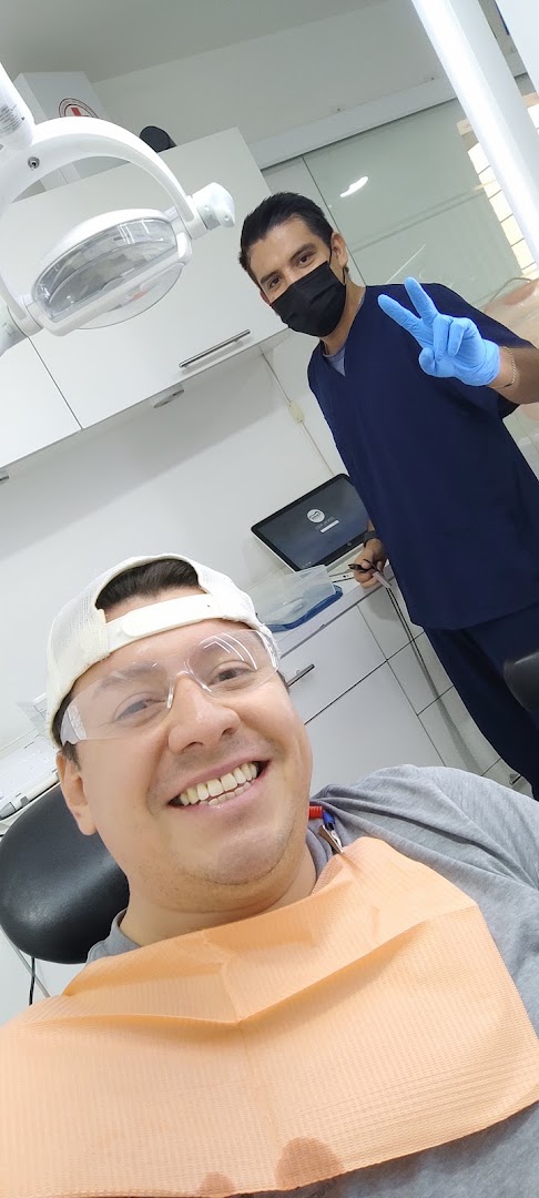 Paciente feliz con su dentista